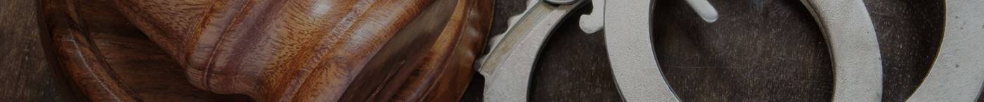 Handcuffs and gavel representing California criminal law changes under Prop 36