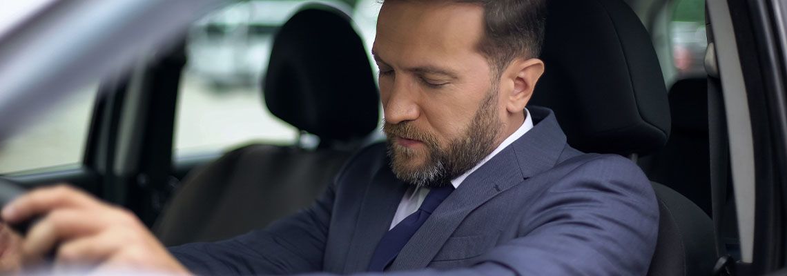 Sleepy Man Driving Car