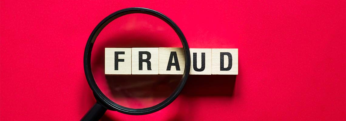 Fraud word concept on cubes