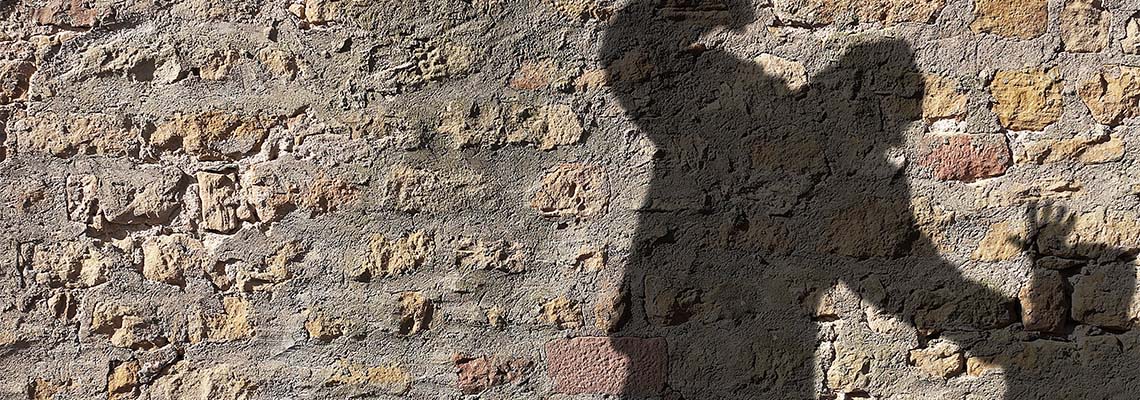 Shadow figures representing Assault