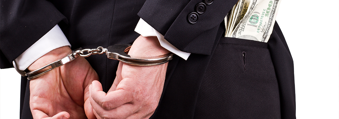 Person in Handcuff with Cash on his Pocket
