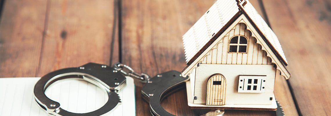 House model and handcuffs